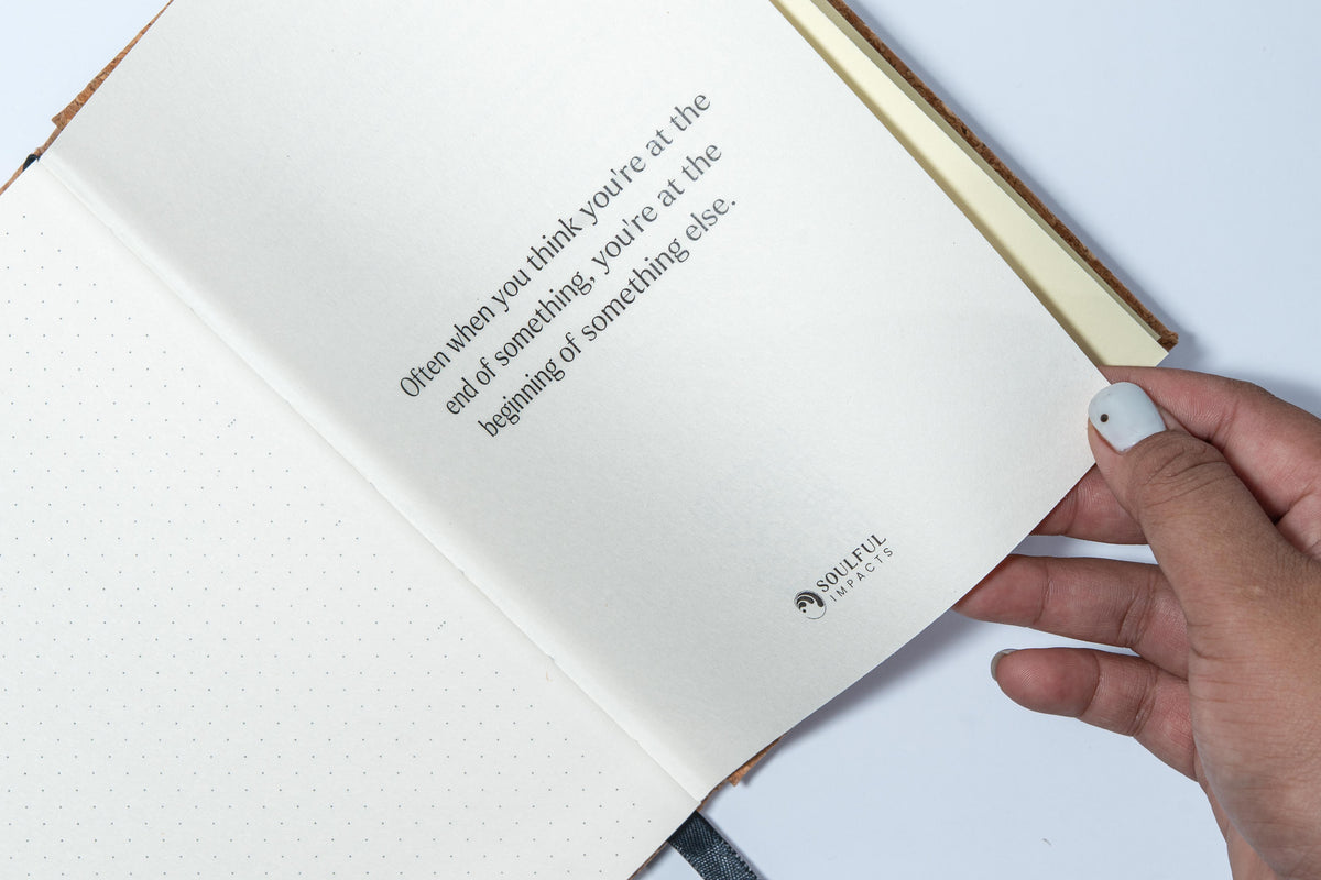 A5 cork bullet journal being used for planning and journaling with quote