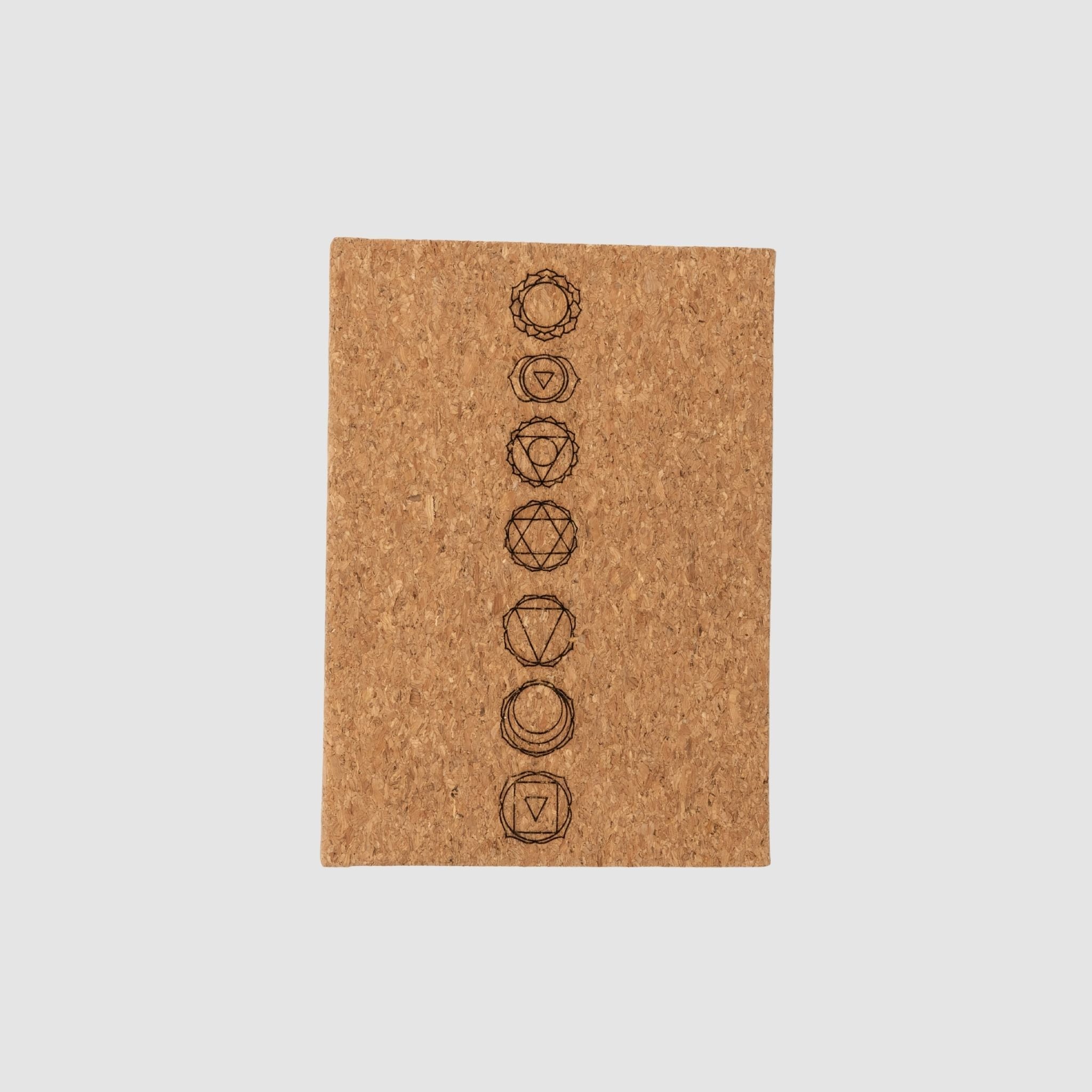 Cork hardcover blank notebook with chakra design, on a white background
