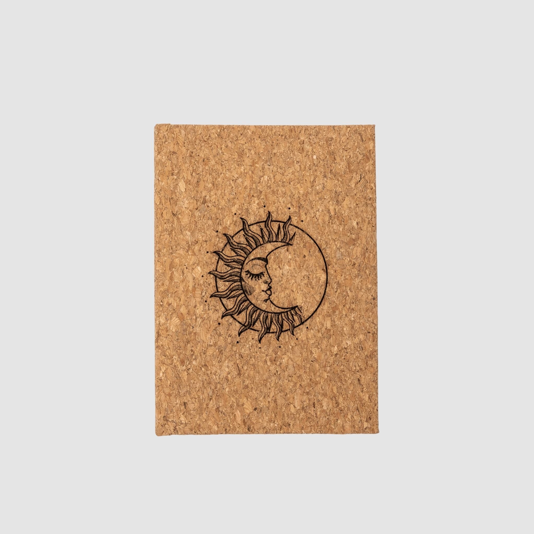 Cork hardcover blank notebook with sun-moon design, on a white background